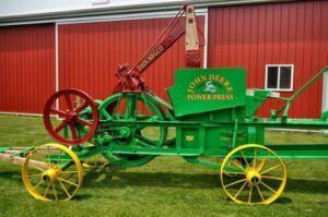John Deere bale press
